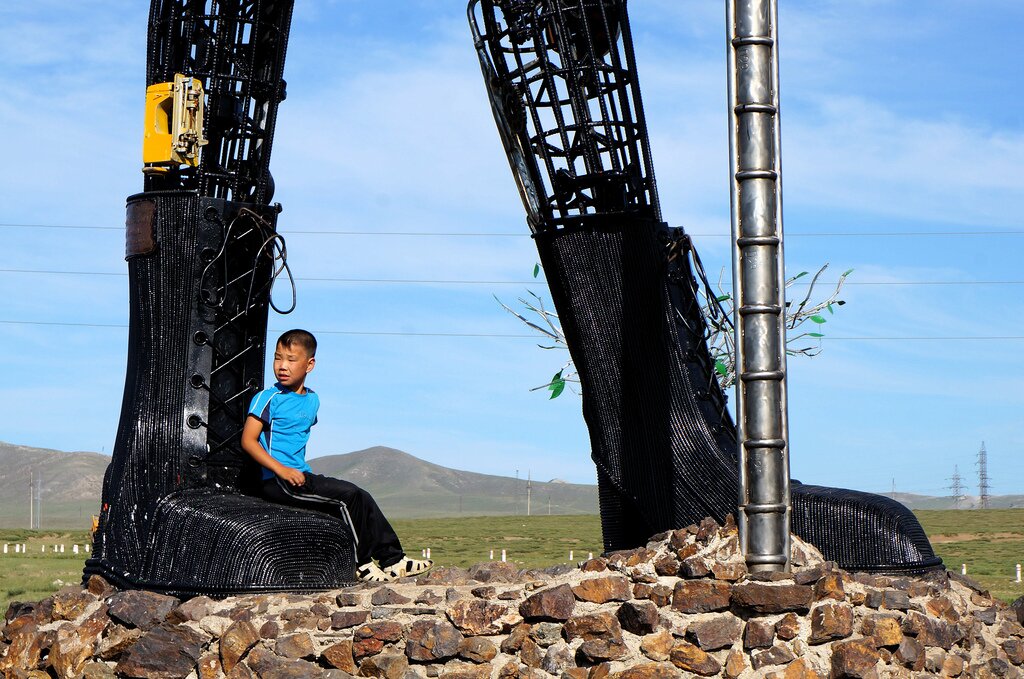 Kid on the Sculpture